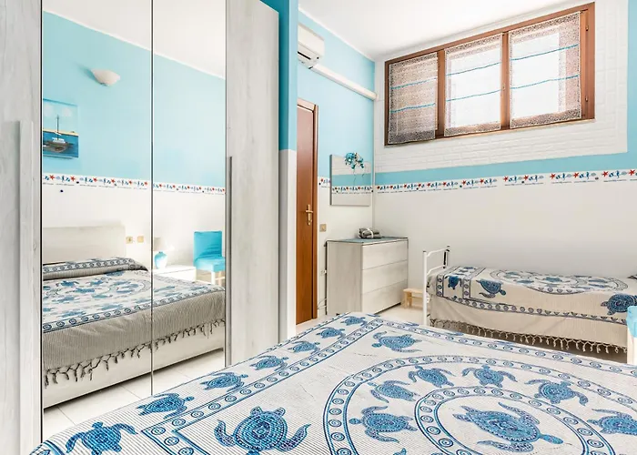 Guesthost - La Collina - Yellow Apartment! Villasimius